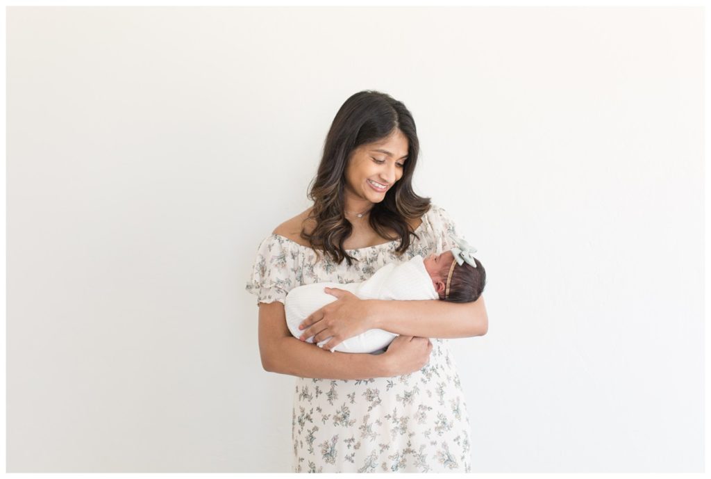 Mother holding baby girl newborn photography Norman ok