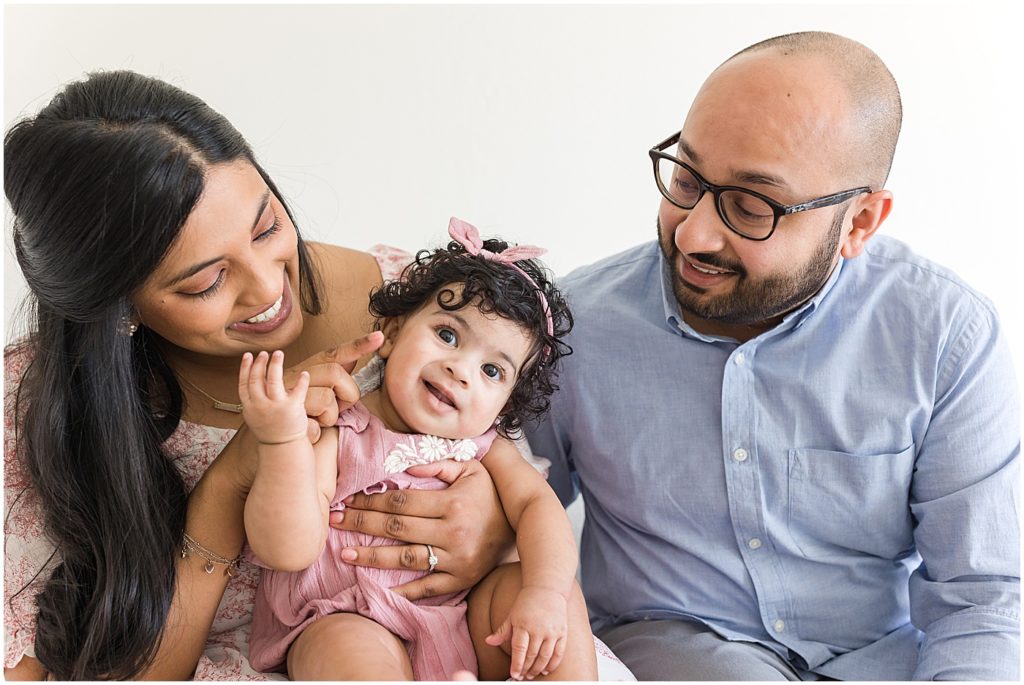 OKC baby photographer | Family snuggling together 