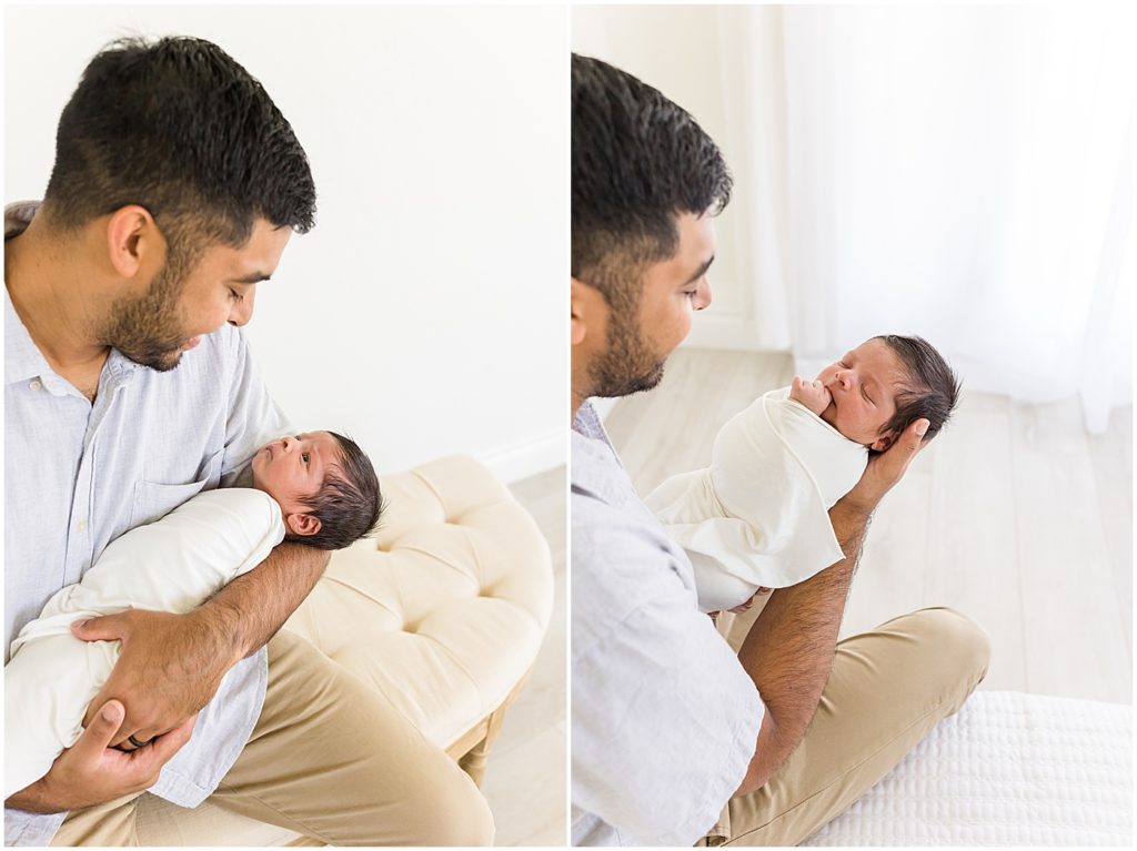 Dad holding baby boy swaddled studio session Oklahoma Newborn Photographer