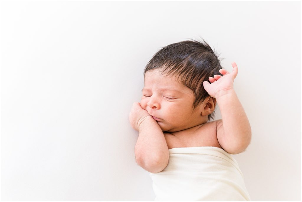 Baby boy lay down in studio Oklahoma Newborn Photographer