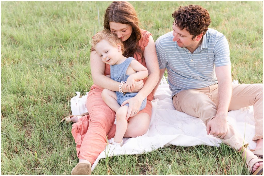 Photographers in Yukon OK Mothers holding son dad outdoor session