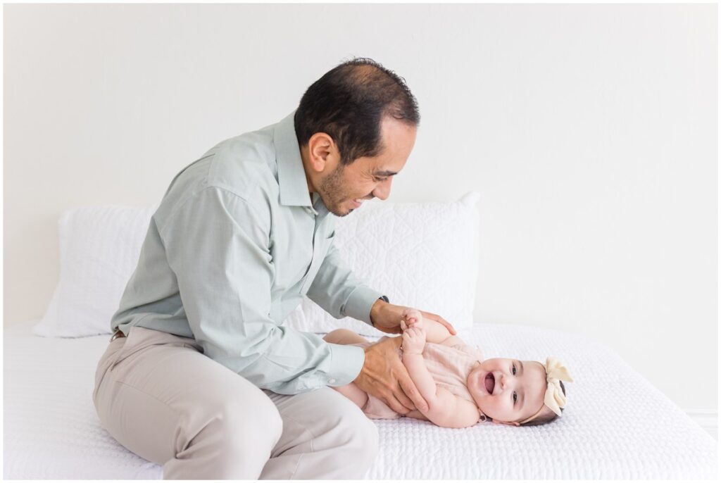 Dad looking at baby in OKC Studio